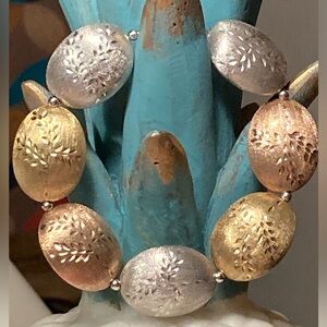 14k Clad Tri-Colored Satin Carved Puffed Bead Bracelet
